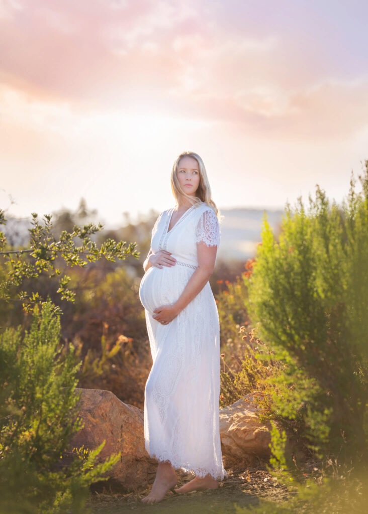 Mom to be photographed in Encino with the sunset behind 6 Amazing Places for a Prenatal Massage in Los Angeles
