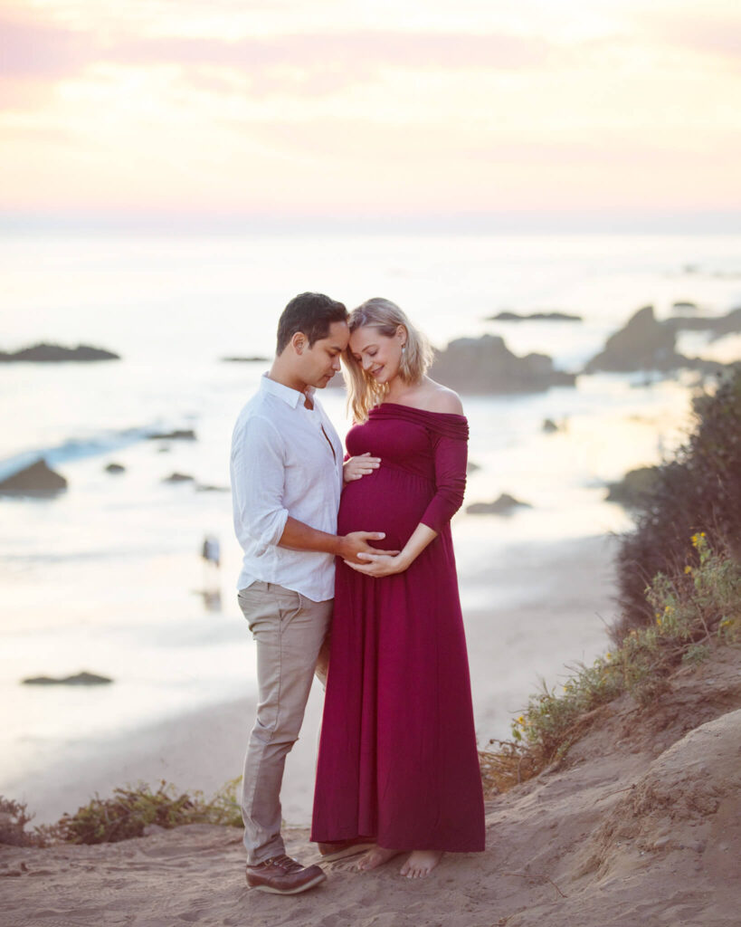 maternity photoshoot of husband and wife expecting their first baby photographed for an el matador beach photoshoot