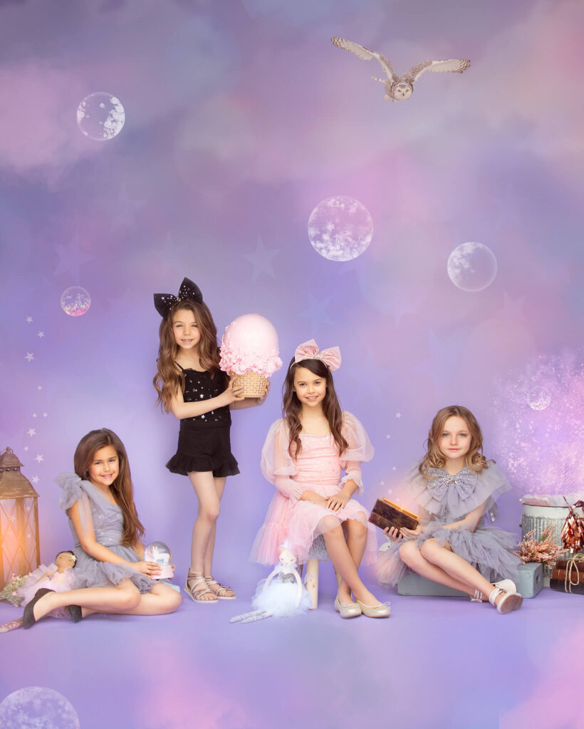 4 young models photographed on a purple dreamy setting by Elsie Rose Photography - Indoor Playgrounds Los Angeles